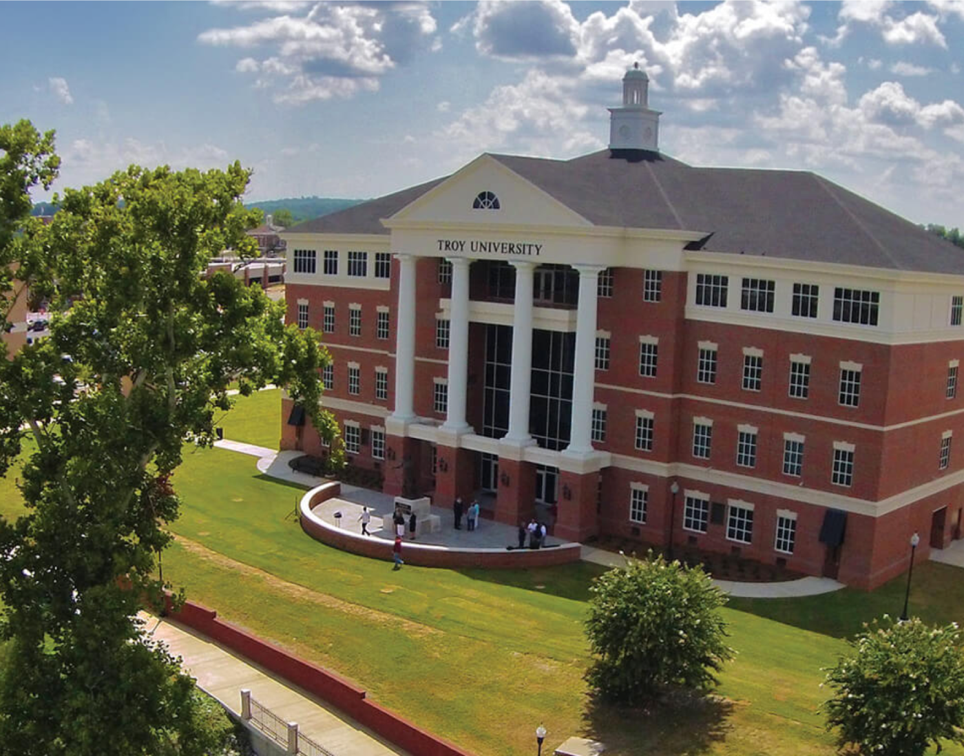 Troy University Building and few students walking along it