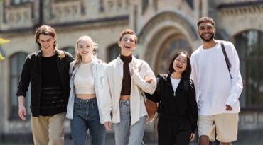 5 students walking happily together